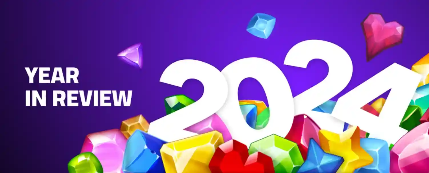 2024 year in review with colorful gems on a vibrant purple background.